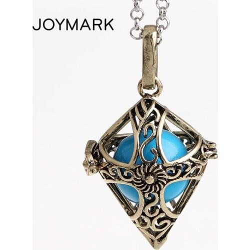 JOYMARK 12pcs/lot 4 Colors Cross Style Hollow Copper Chime Magic Box Cage Musical Sound Ball Pregnancy Necklaces HCPN35