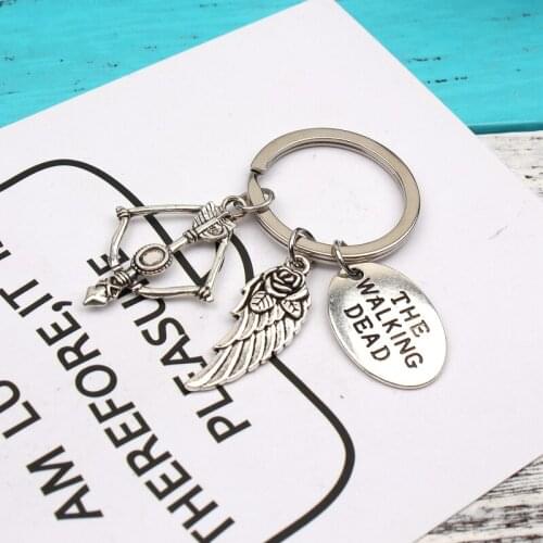 New Fashion KeychainThe Walking Dead Pendants DIY Men Jewelry Car Key Chain Ring Holder Souvenir For Gift wing And bow