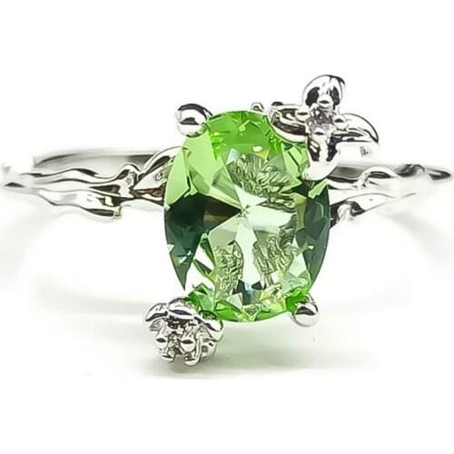 Wholesale Fashion Simple Inlaid Egg-shaped Green Zircon Womens Ring Small Flower Ladies Banquet Ring Jewelry