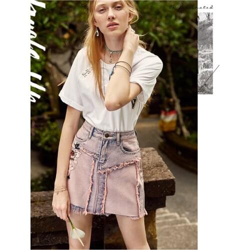 2020 spring and summer Europe and the United States new wild embroidered PU leather rivets washed denim skirt