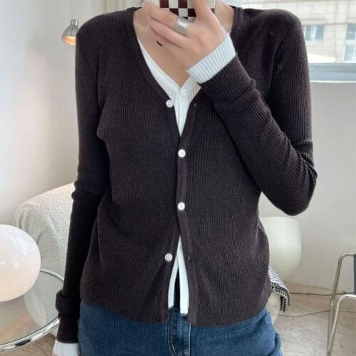 Spring and autumn womens casual solid color V-neck long-sleeved slim fake two-piece cardigan sweater