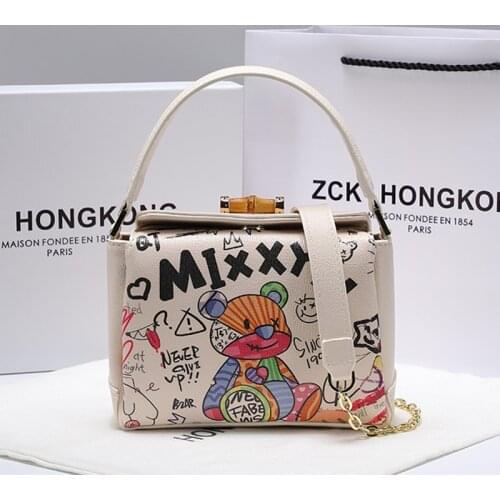 2021 New Fashion Genuine Leather All-match Bear Graffiti Shoulder Satchels Portable Small Square Bag Purses and Handbags Luxury