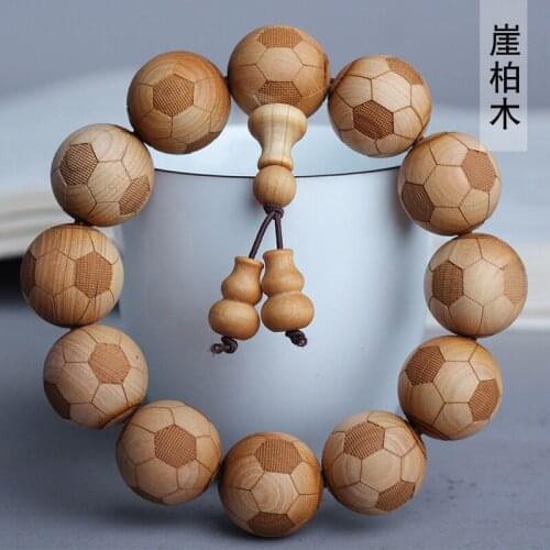Cliff cypress full-carved football string specifications 2.0 x 12 mens and womens style play beads decorative jewelry