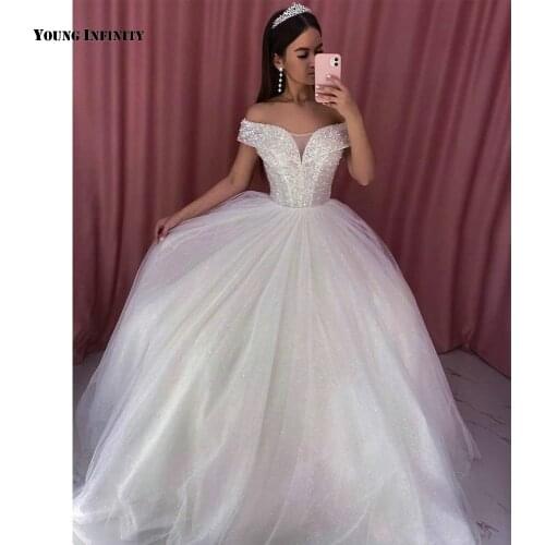 Romantic Ball Gown Wedding Dresses 2021 Sleeveles Bridal Gown Backless Off The Shoulder Sequined White Plus Size Bride