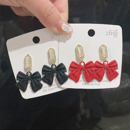 Black bowknot earring of new style tide Korea INS temperament web celebrity earpiece is acted the role of hot style eardrop fema