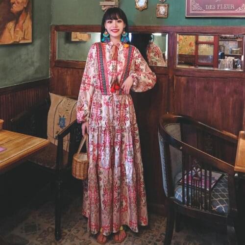 Make web celebrity in same national wind orientation posed loose holiday dress three color printing embroidery tassel