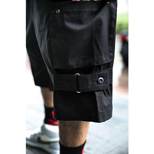 Mens summer new solid color Multi Pocket loose fashion fashion tooling Capris youth fashion straight shorts