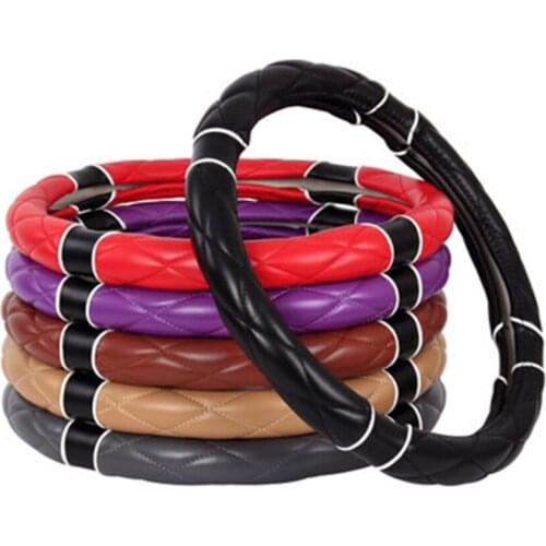 Car steering wheel cover four seasons universal non-slip handle cover leather men and women personality creative interior suppli