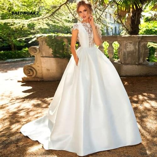 2021 New Arrival Weddding Dresses for Women Appliques Pockets Cap Sleeves Simple Button Illusion Bridal Gowns Vestido De Novia