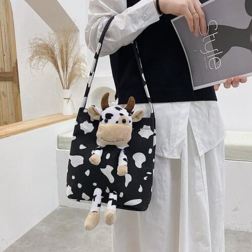 Korean version of cute cow canvas bag fashion large-capacity portable female bag student one-shoulder diagonal bag bucket bag