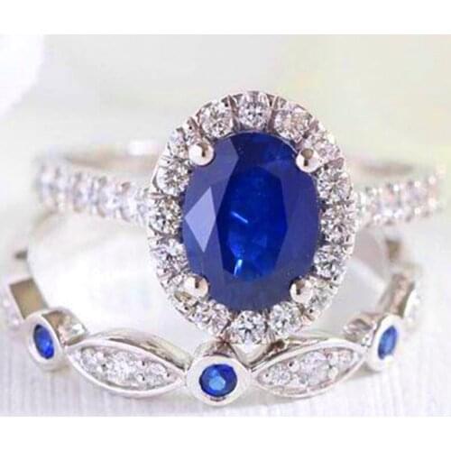 Fashion Temperament Egg-shaped Blue Crystal Ring Simple Creative Inlaid White Crystal Ladies Banquet Ring Whole Sale