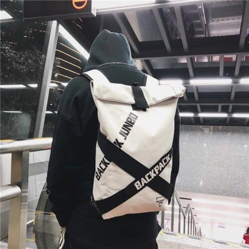 Student bag female Korean version of students campus backpack fashion trend street shooting backpack men travel tide package