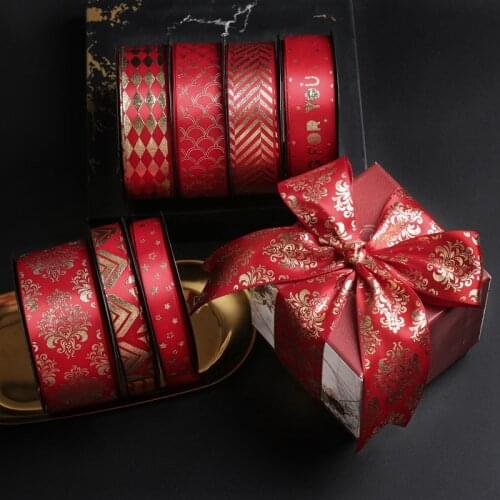 Red hot stamping ribbon diy bow hair flower bouquets of PMC festival festival gift box packaging polyester belt