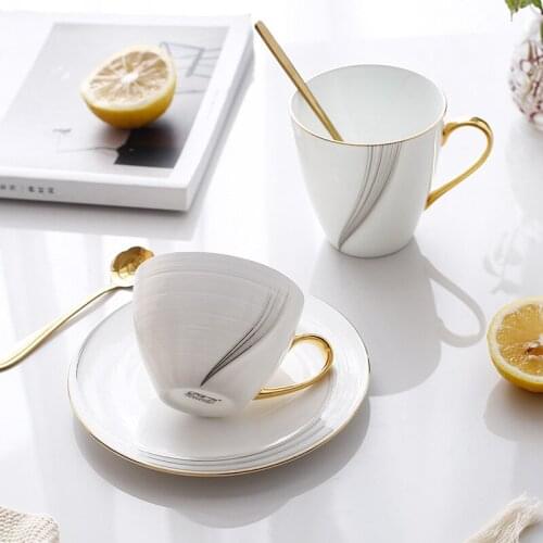 White Simplicity Modern Cup Saucer Nordic Bone China Creativity Handmade Tea Cups Ceramic Coffee Cool Tazze Drinkware EK50BD