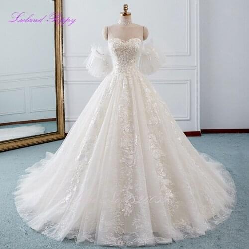 Luxury Womens Ball Gown Lace Appliques Wedding Dresses Sleeveless Sweetheart Neckline Vestido de Novia Bridal Gowns
