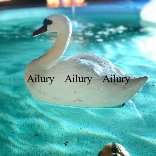 Simulation of white swan, garden decoration, big duck floating on the water, villa fountain decoration