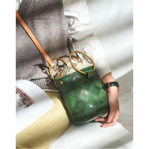 Niche design metal bracelet drawstring bucket genuine leather woven mini shoulder bag handmade vegetable tanned leather handbag