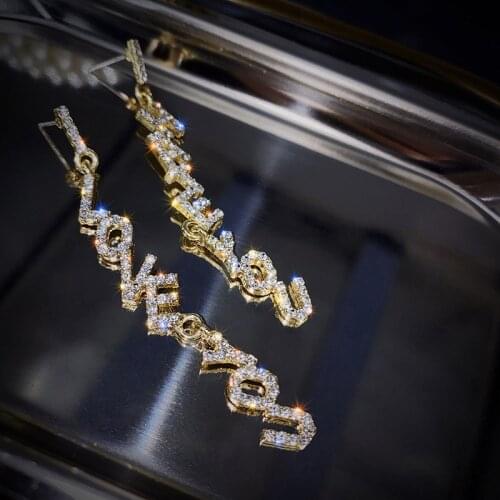 Letter love earrings, long tassels, thin face earrings, Korean temperament net red, simple niche design female earrings