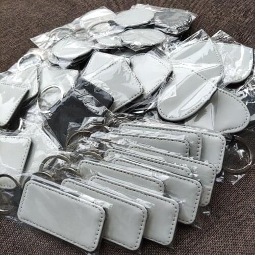 Free Shipping 100pcs/lot Blank Sublimation PU Leather Pendant Tags KeyChain DIY Printing Sublimation Ink Transfer paper