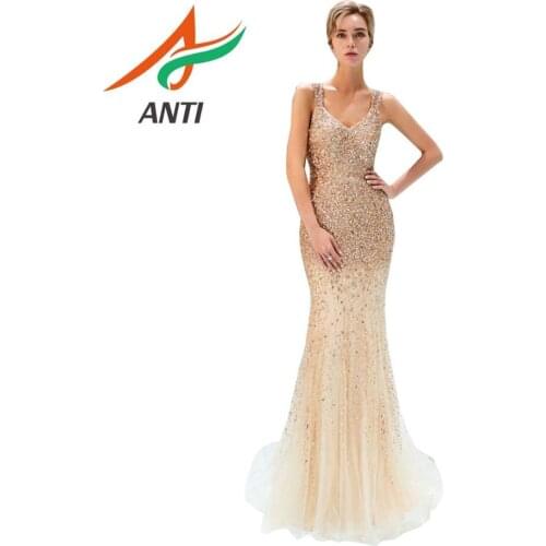 ANTI Shiny Evening Dresses Mermaid Deep V-neck Champagne Long Beaded Crystal Prom Gown Sexy Spaghetti Strap Sweep Train illusion