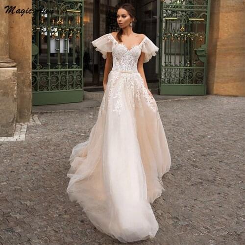 Magic Awn Beach Light Champagne Wedding Dresses Off The Shoulder Lace Appliques Boho Princess Bridal Gowns A-Line Abito Da Sposa