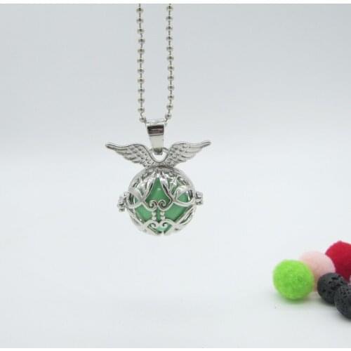 Flying Wing on the Hollowed Locket Ball Interchangeable Lava Bead Diffuser Glowing in the Dark Pregnancy Chime Ball Necklace