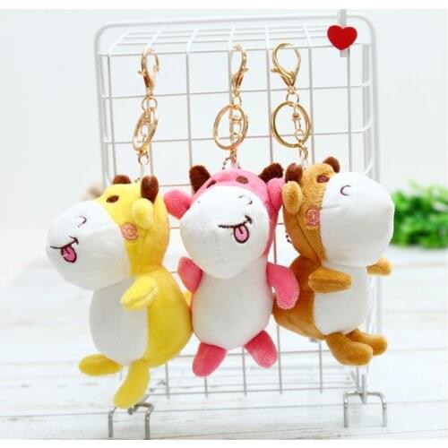 Popular Tongue out Funny cattle cow pendant Keychain car Decorate good quality baby toy Soothing doll christmas colourful gift