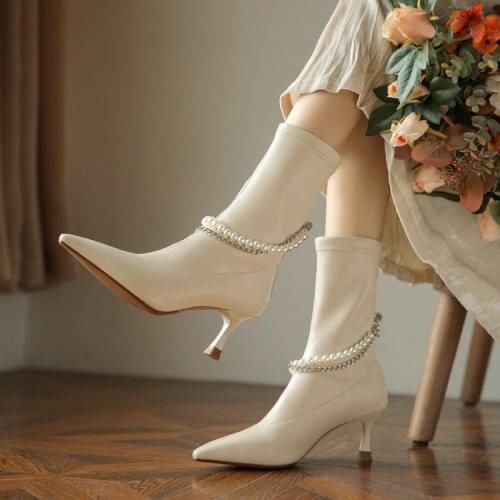 Korean 2021 new mid-tube boots pointed stiletto high-heeled pearl metal chain elastic boots one-step womens boots