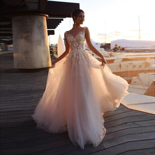 2020 Lace Wedding Dresses with Long Train Boho A Line Appliques Bride Dresses Romantic Buttons Back Vestidos de novia