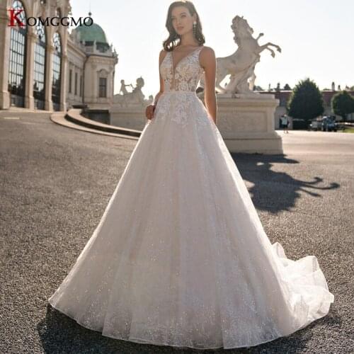 High-End Deep V-Neck Sleeveless Shiny Chapel Train Bridal Ball Gown Custom Made Button Embroidery Appliques Tulle Wedding Dress
