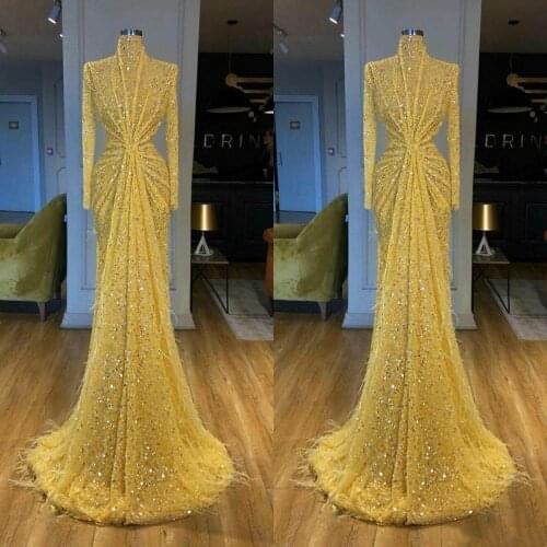 2021 Arabic Yellow Feather Mermaid Prom Dresses Luxury Beading Sequined High Neck Long Sleeve Women Plus Size Evening Gowns