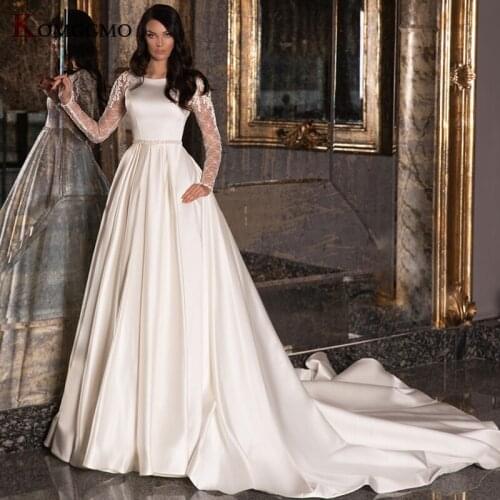 Custom Made O-Neck Full Sleeve Embroidery Appliques Tulle Bridal Ball Gown High-End Chapel Train Backless Wedding Dress 2021