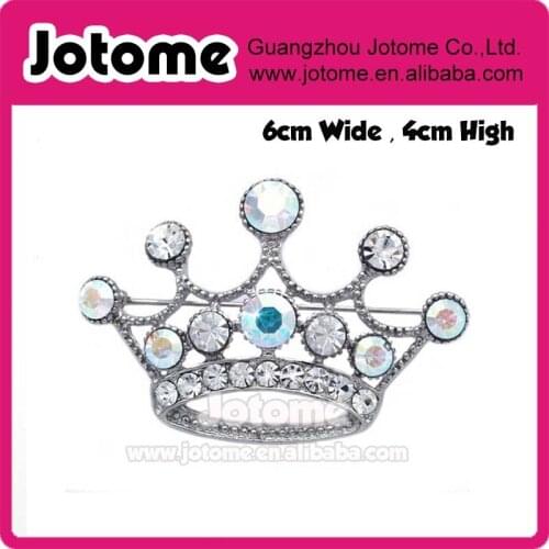 Large rhinestone crown brooch use for wedding bouquet . Bridal sash , embellishment , wedding favor