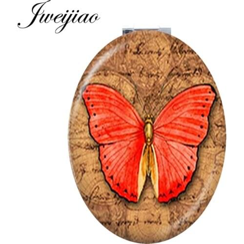 JWEIJIAO red Butterfly vintage clock Oval pocket Folding mirror Darwin Biological Evolution Theory moive Travel Mirror D1249