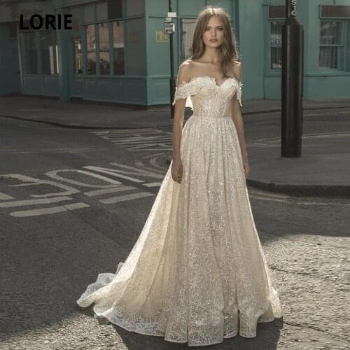 LORIE 2020 Bohemian Wedding Dresses Boho Off Shoulder Appliqued Lace Beaded Sequins Sleeveless Bridal Gowns Backless Ruffle Sash