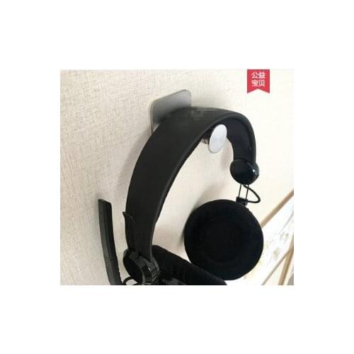 Simple and fashionable design universal wall-mounted metal sticker high-end head-mounted retractable earphone holder J06