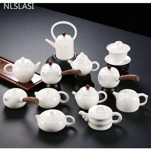 Handmade quality white porcelain teapot ivory white wooden handle teapot tea set Chinese tea room etiquette tool teapot