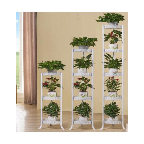 Iron art flower stand with floor type flowerpot. Balcony green flower shelf