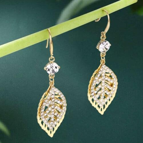 2021 South Korea Fashion Asymmetrical Hollow Leaf Earrings Temperament Fashion Ear Hook Tassel Female Earrings