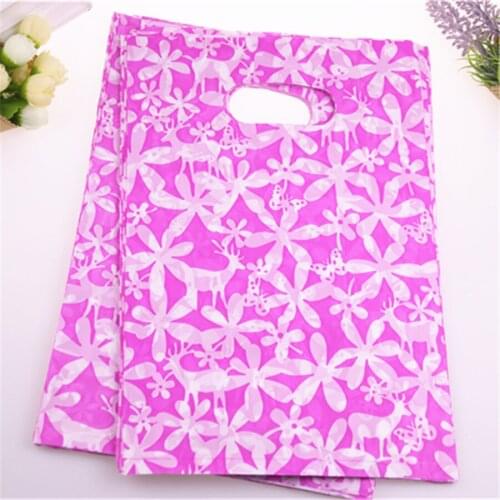 New Design Hot Sale Wholesale 100pcs/lot 20*30cm Medium Plastic Birthday Gift Bags With Sunflower Pink Wedding Candy Packaging