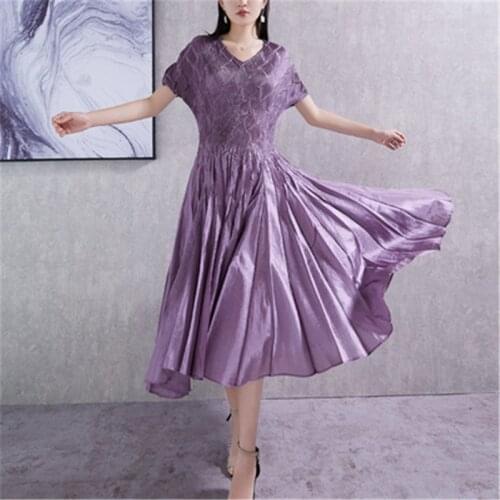 High-end Miyake pleated design dress, fashionable large size slim and thin, heavy industry embossed irregular purple dress women