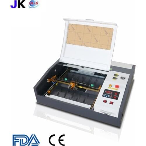 Freeshipping Top quality corellaser 40w 50w 4040 leather laser engraving machine