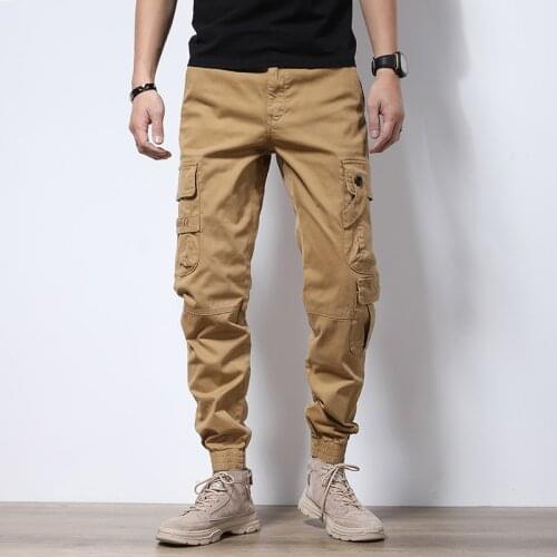 European Street Fashion Men Jeans Multi Pockets Spliced Designer Casual Cargo Pants Men Overalls Hip Hop Joggers Harem Trousers
