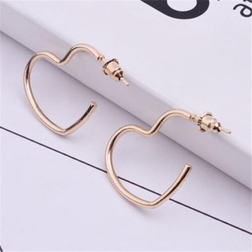 New Fashion Hollow Love Heart Earring Metal Plating Ornaments Simple Dangle Earrings For Women Copper Brincos Jewelry