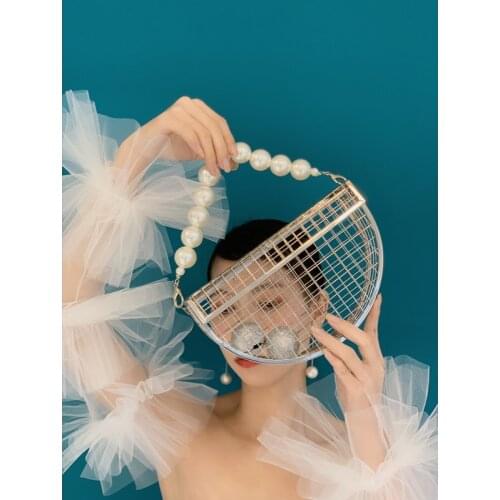 Fashion abs pearl handle hollow out metal clutch bag ladies