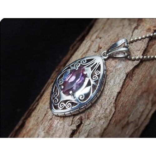 Nepal. Elegant and noble natural amethyst. 925 Silver Hand-carved Delicate Pendant