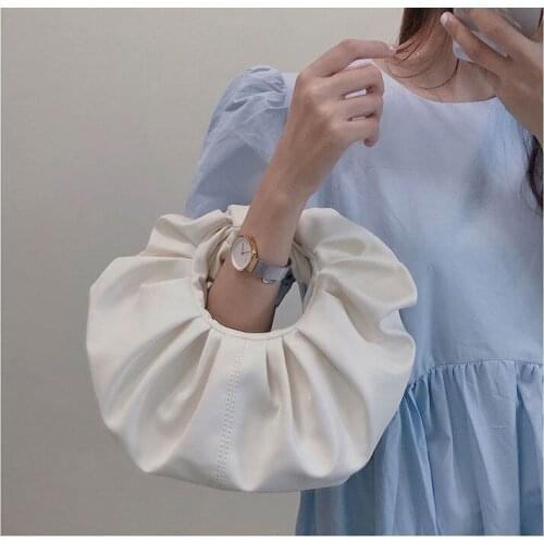 Niche design fold cloud casual soft leather handbag female 2020 spring and summer new round messenger bag