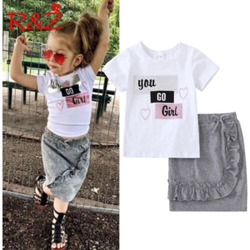 R&Z childrens suit 2019 summer new ins girls cotton short-sleeved letter shirt ruffled bag hip skirt two-piece