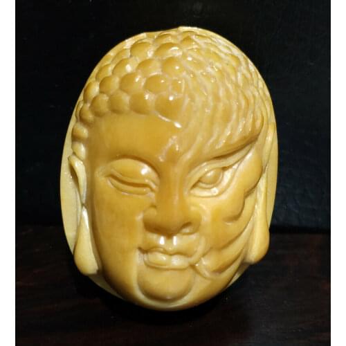 TN1389 - 2" Hand Carved Tagua Nut Netsuke - Blink of The Heart - Mask