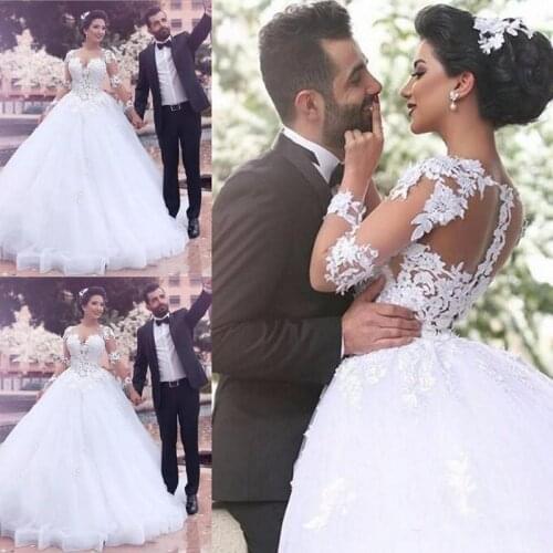 Saudi Arabic Middle East Ball Gown Wedding Dresses Sheer Jewel Long Sleeves Lace Appliques Button Back Long Vestidos Bridal Gown